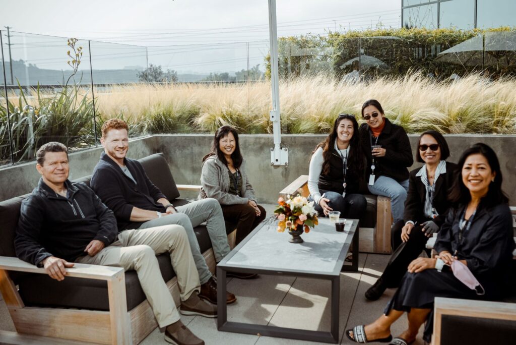 Fairfield employees happy to socialize face to face again at our Back to the office happy hour at our brand new corporate office.