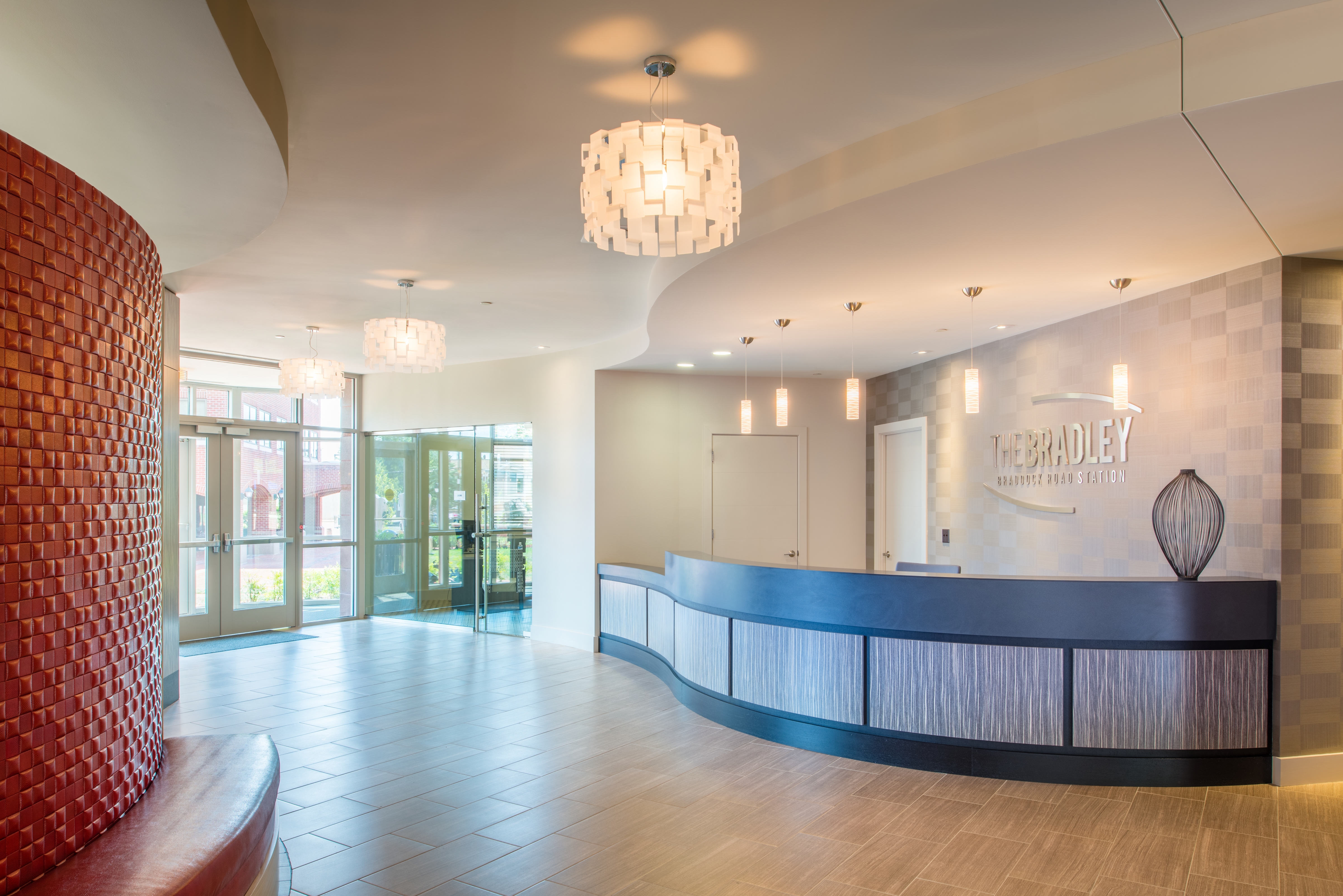 A bright and spacious building lobby at the Bradley Braddock Apartments.