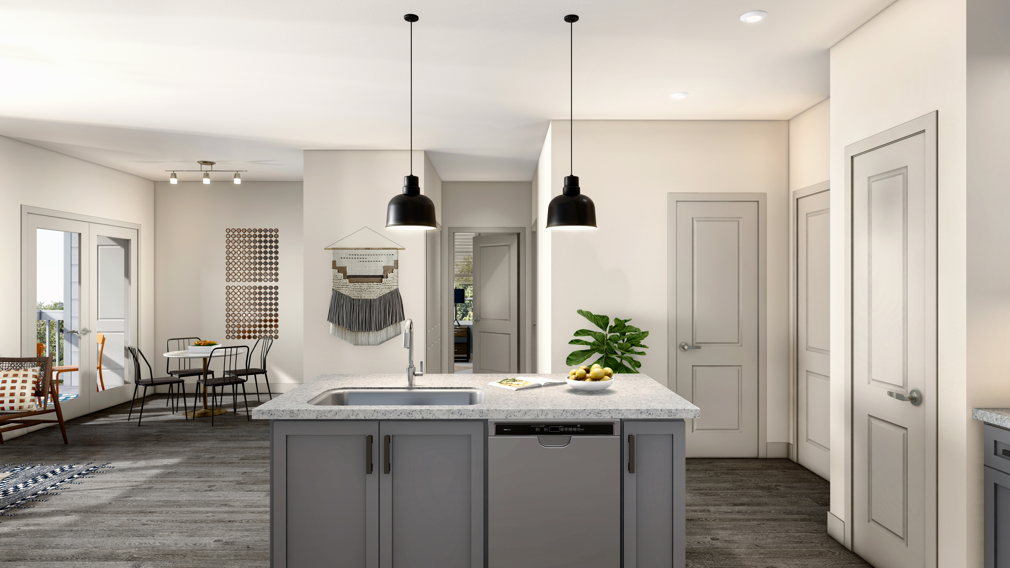 A bright and monochromatic kitchen at the Station 117 Apartments in Franklin, MA.