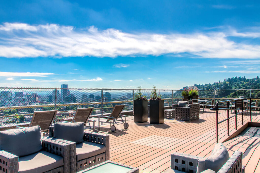 rooftop lounge chairs and view at 735 st clair apartments in portland or