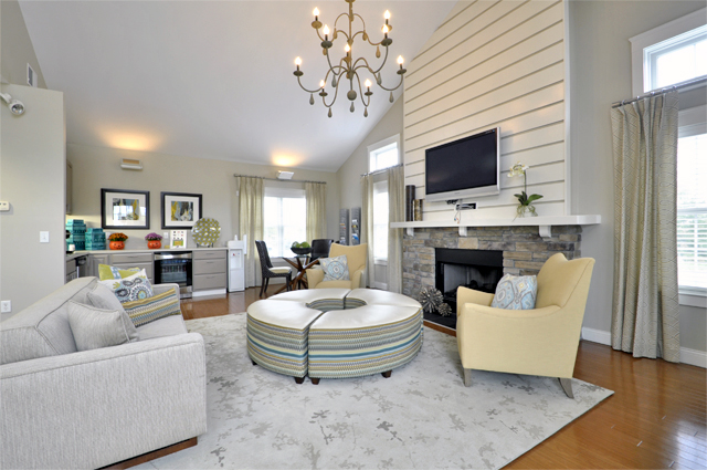 Corner view of a well-appointed living room at Windshire Terrace Apartments